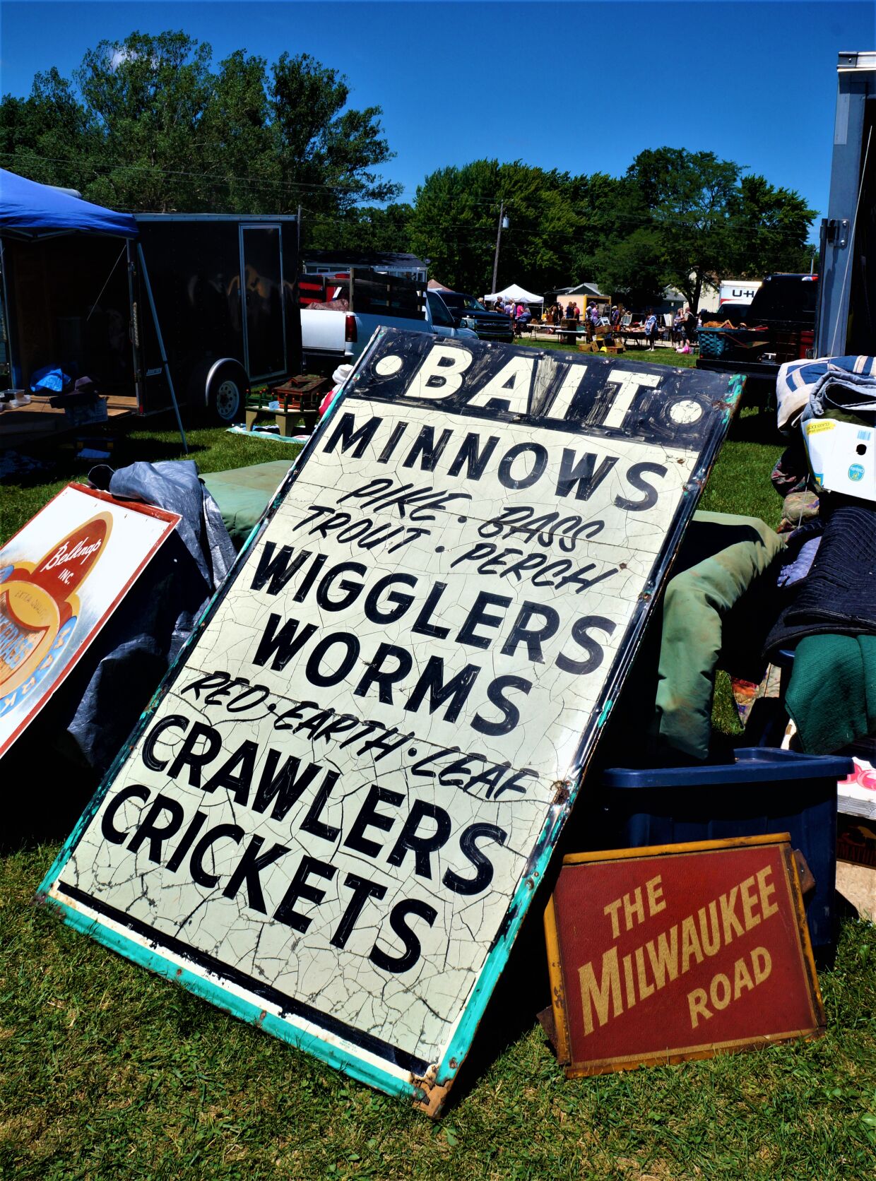 Vintage signs on display at the June 26 Elkhorn Antique Flea Market